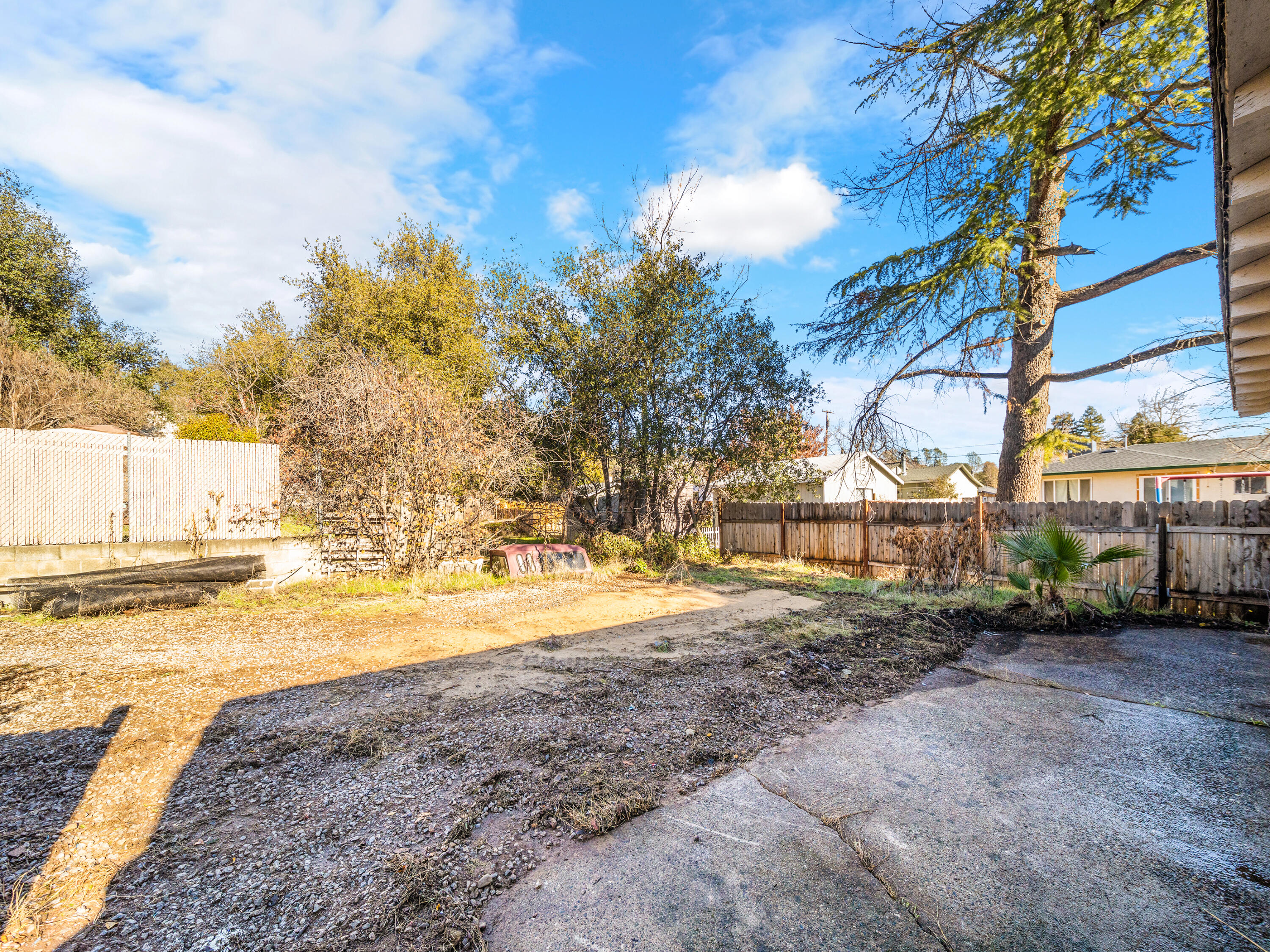 2921 West Way Redding, CA 96002 - Photo 26 of 36 a view of a yard with wooden fence
