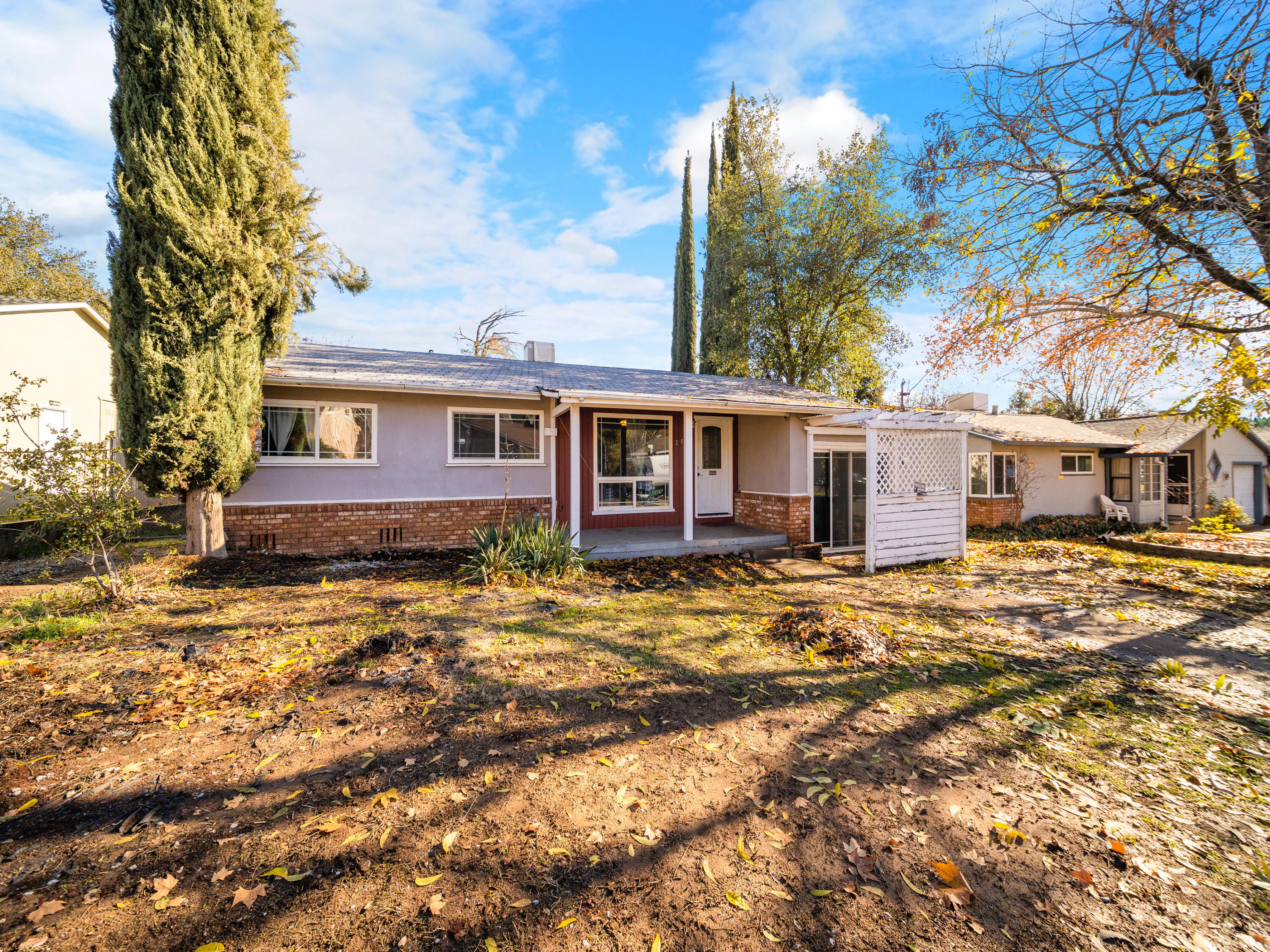 2921 West Way Redding, CA 96002 - Photo 32 of 36 a front view of a house with a yard
