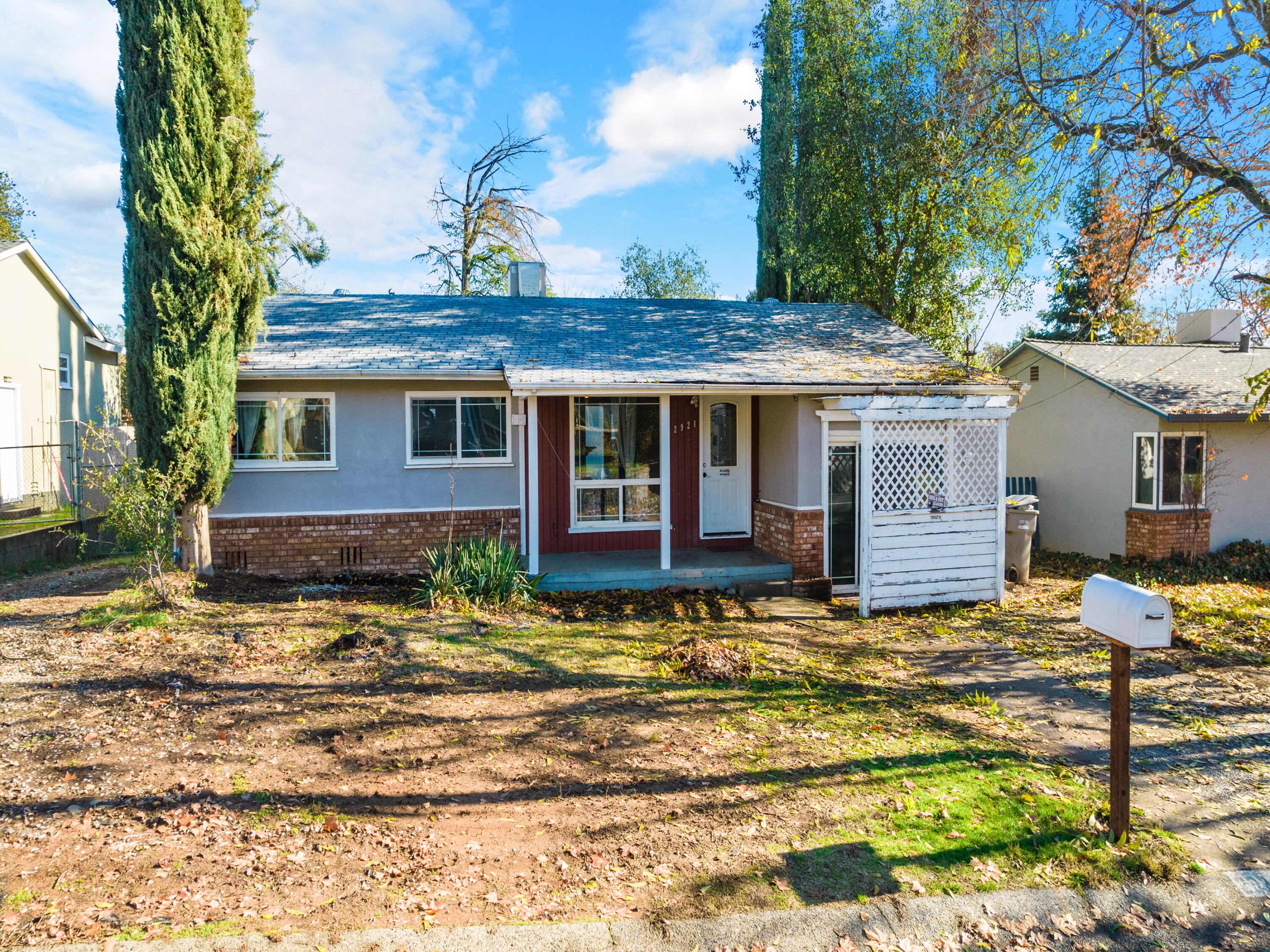 2921 West Way Redding, CA 96002 - Photo 34 of 36 a view of a house with a patio