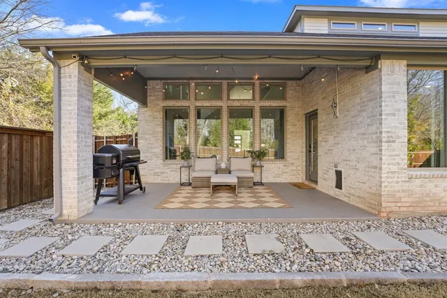 a view of a living room and a rug