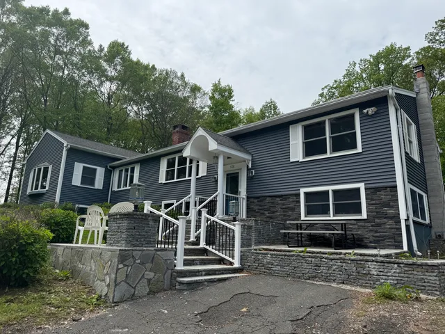 a front view of a house with a porch
