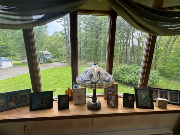 a view of living room with furniture and window