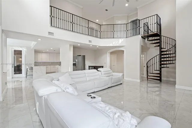 a white toilet sitting next to a small bathroom