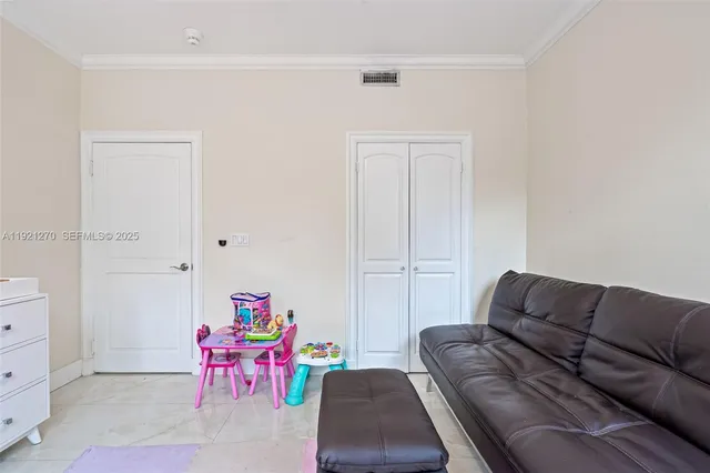 a bathroom with a toilet a sink a mirror and shower