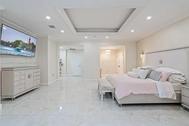 a front view of a residential apartment building with a yard