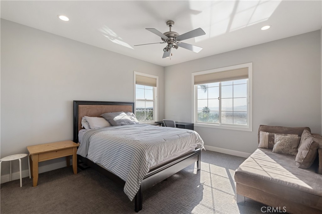 9669 Norbrook Drive Rancho Cucamonga, CA 91737 - Photo 30 of 47 a bedroom with a bed and window