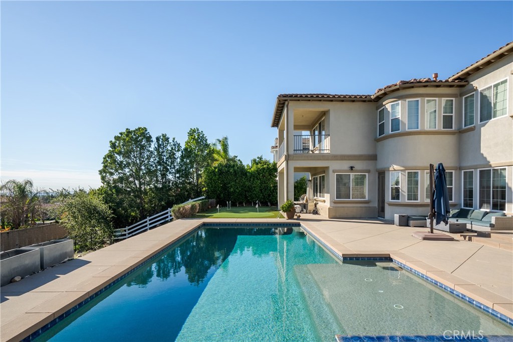 9669 Norbrook Drive Rancho Cucamonga, CA 91737 - Photo 36 of 47 a swimming pool view with a outdoor seating