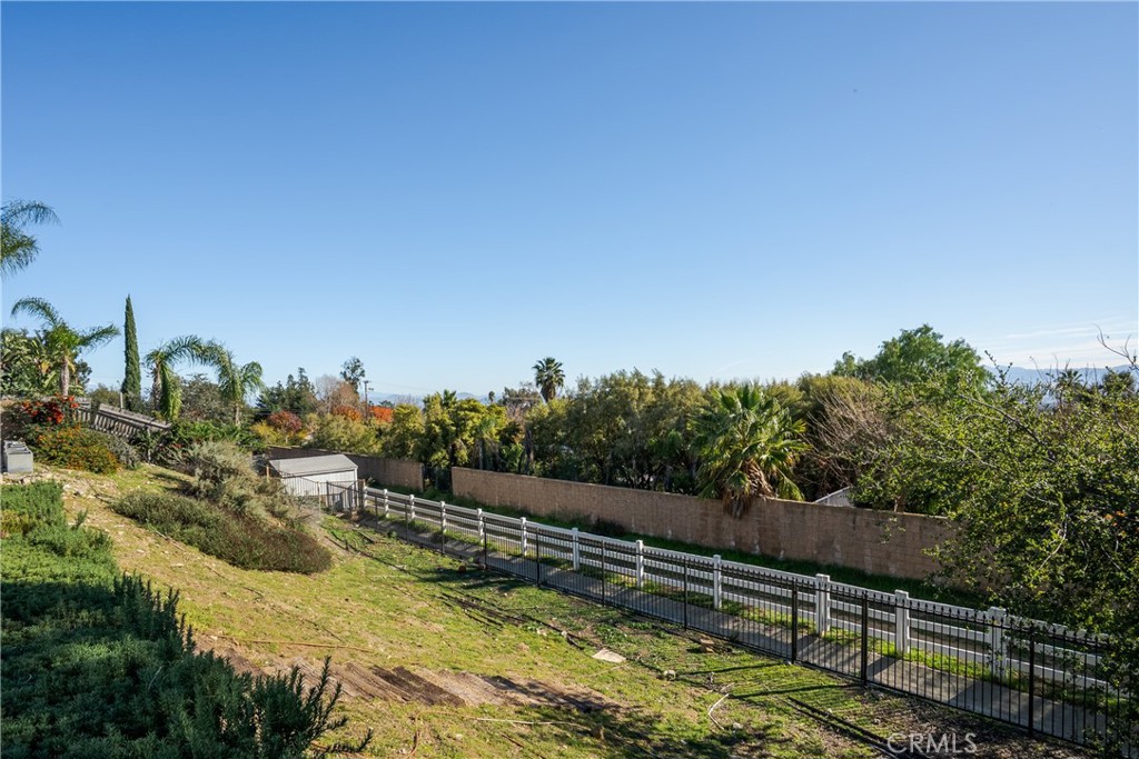 9669 Norbrook Drive Rancho Cucamonga, CA 91737 - Photo 41 of 47 a view of a yard with wooden fence
