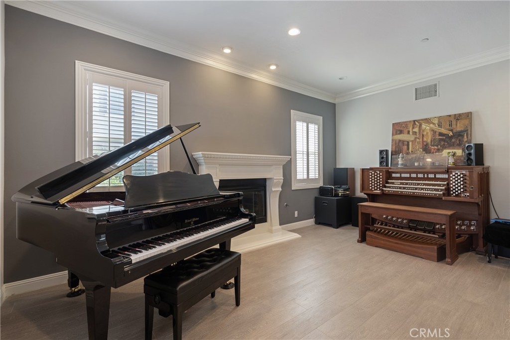 9669 Norbrook Drive Rancho Cucamonga, CA 91737 - Photo 5 of 47 a living room with furniture and a piano