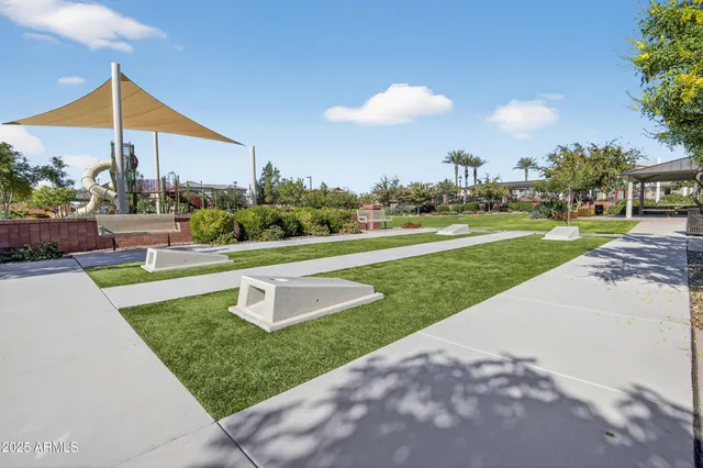 a view of a golf course with a fountain