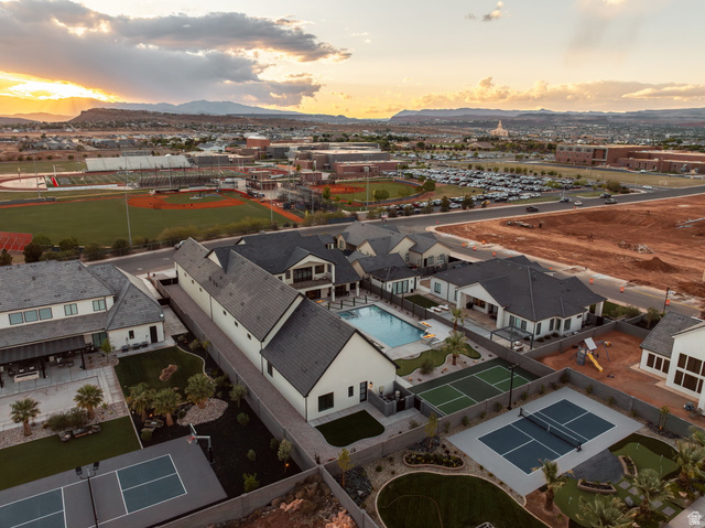 2281 South Crimson Cliffs Way St. George, UT 84790 - Photo 4 of 47 Aerial view at dusk of a mountain view and view of pool
