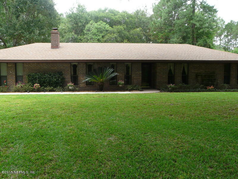 1212 Cactus Cut Road Middleburg, FL 32068 - Photo 1 of 36 a view of house with yard and car parked