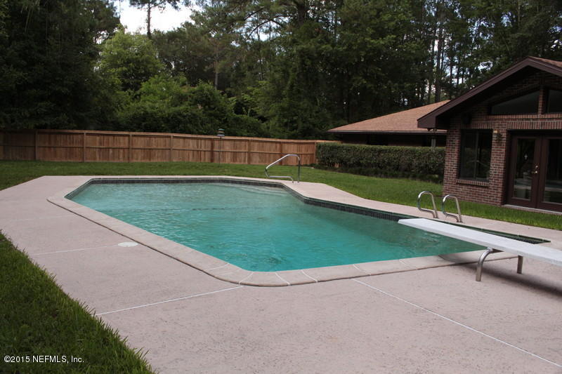 1212 Cactus Cut Road Middleburg, FL 32068 - Photo 5 of 36 a view of a backyard with swimming pool
