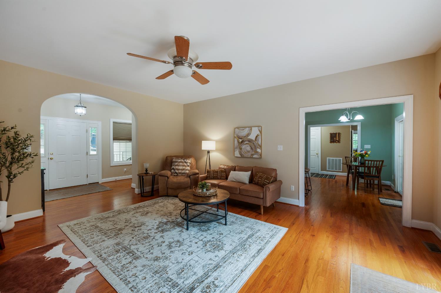 429 Matohe Road Monroe, VA 24574 - Photo 11 of 73 a living room with furniture and wooden floor