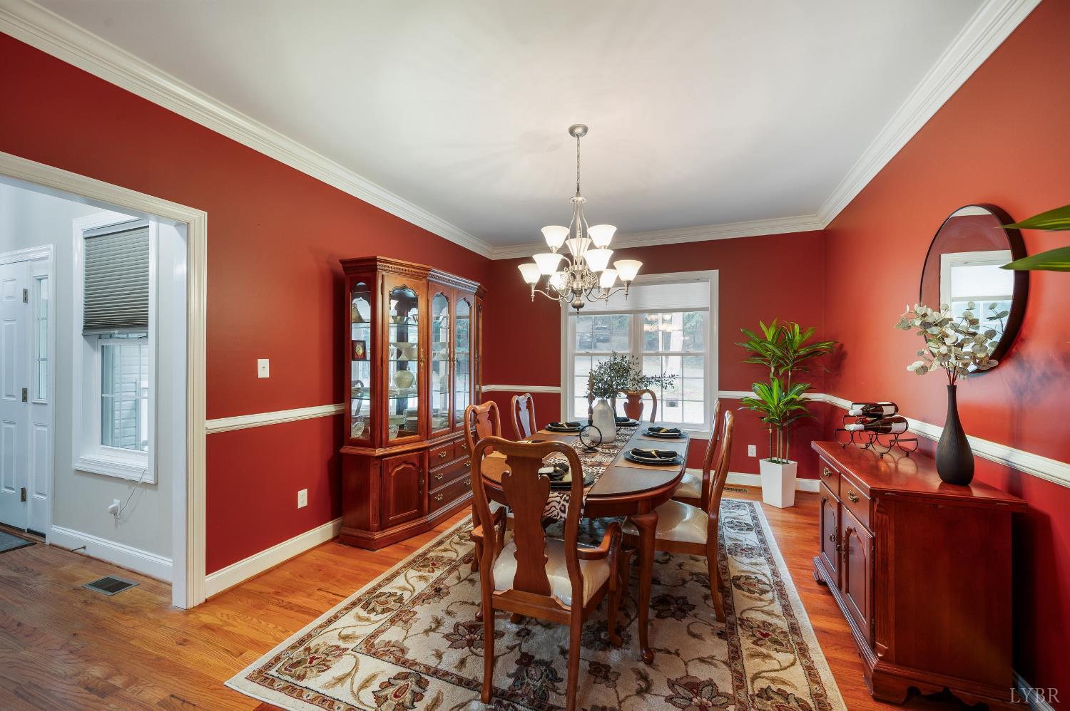 429 Matohe Road Monroe, VA 24574 - Photo 15 of 73 a view of a dining room with furniture and chandelier