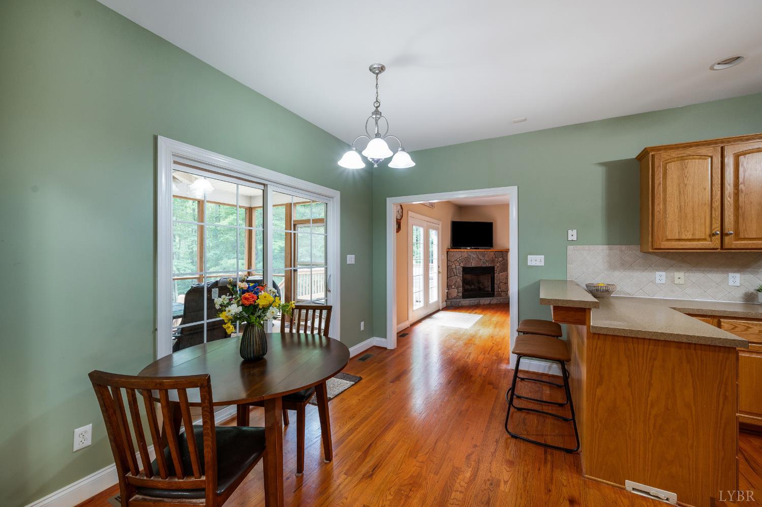 429 Matohe Road Monroe, VA 24574 - Photo 24 of 73 a view of a dining room with furniture window and wooden floor