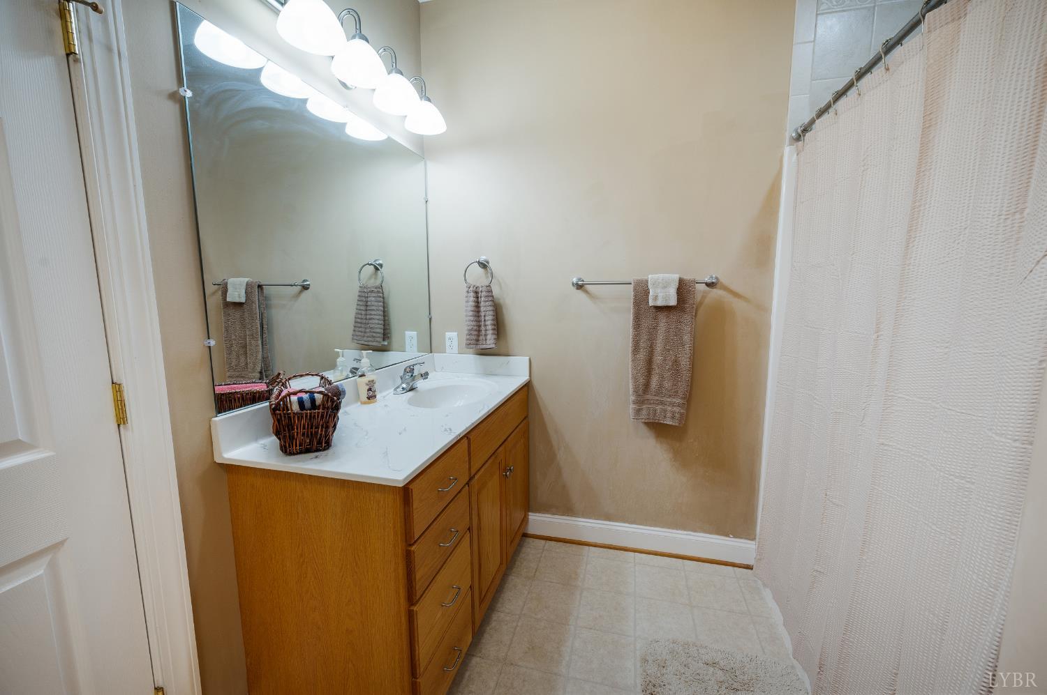 429 Matohe Road Monroe, VA 24574 - Photo 33 of 73 a bathroom with a sink mirror and vanity