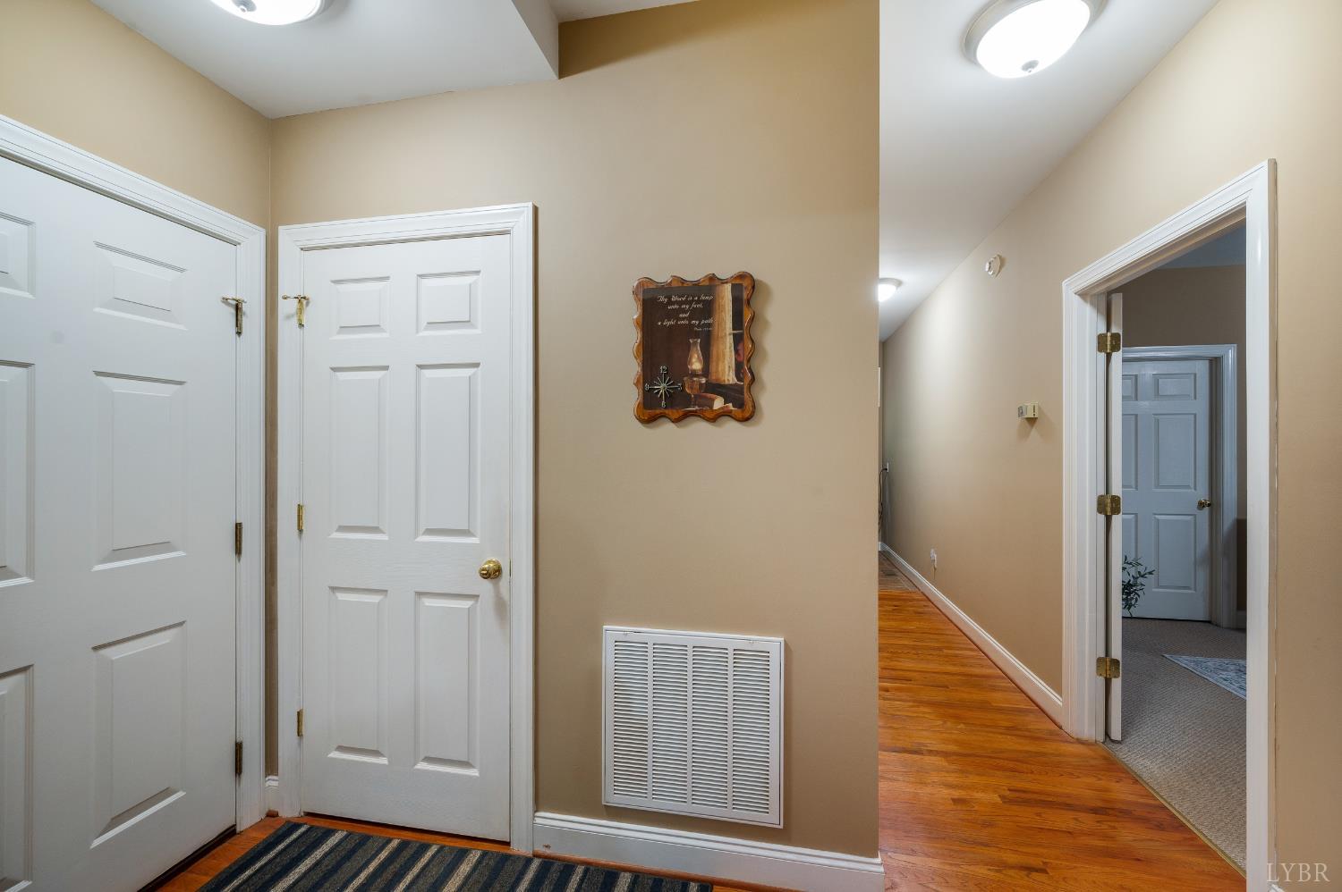 429 Matohe Road Monroe, VA 24574 - Photo 35 of 73 a view of a hallway with wooden floor and staircase