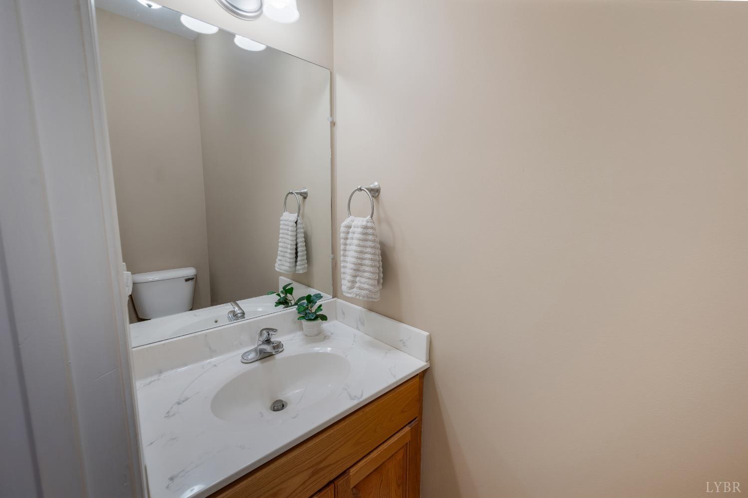 429 Matohe Road Monroe, VA 24574 - Photo 37 of 73 a bathroom with a sink and a mirror