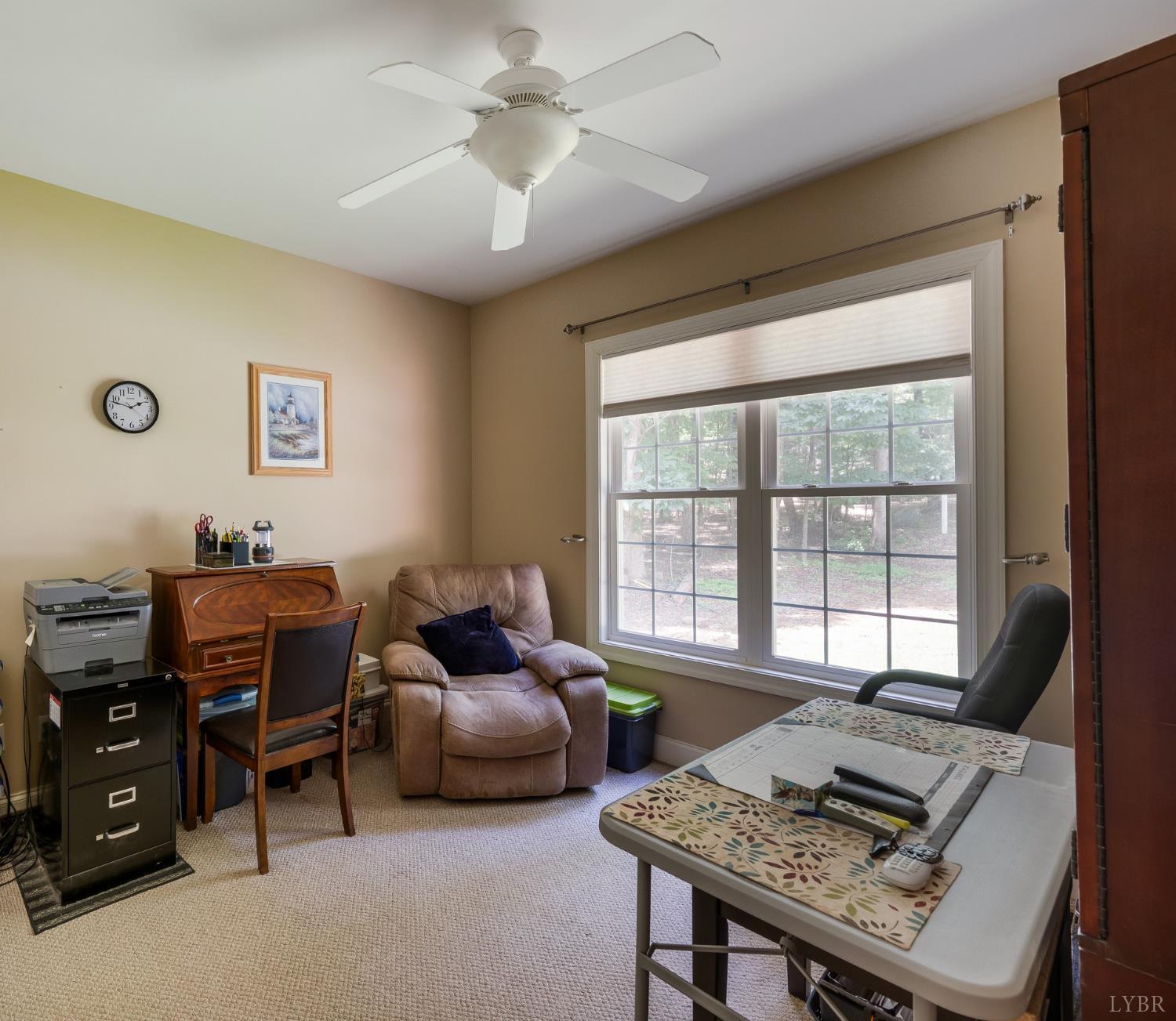 429 Matohe Road Monroe, VA 24574 - Photo 46 of 73 a living room with furniture and a window