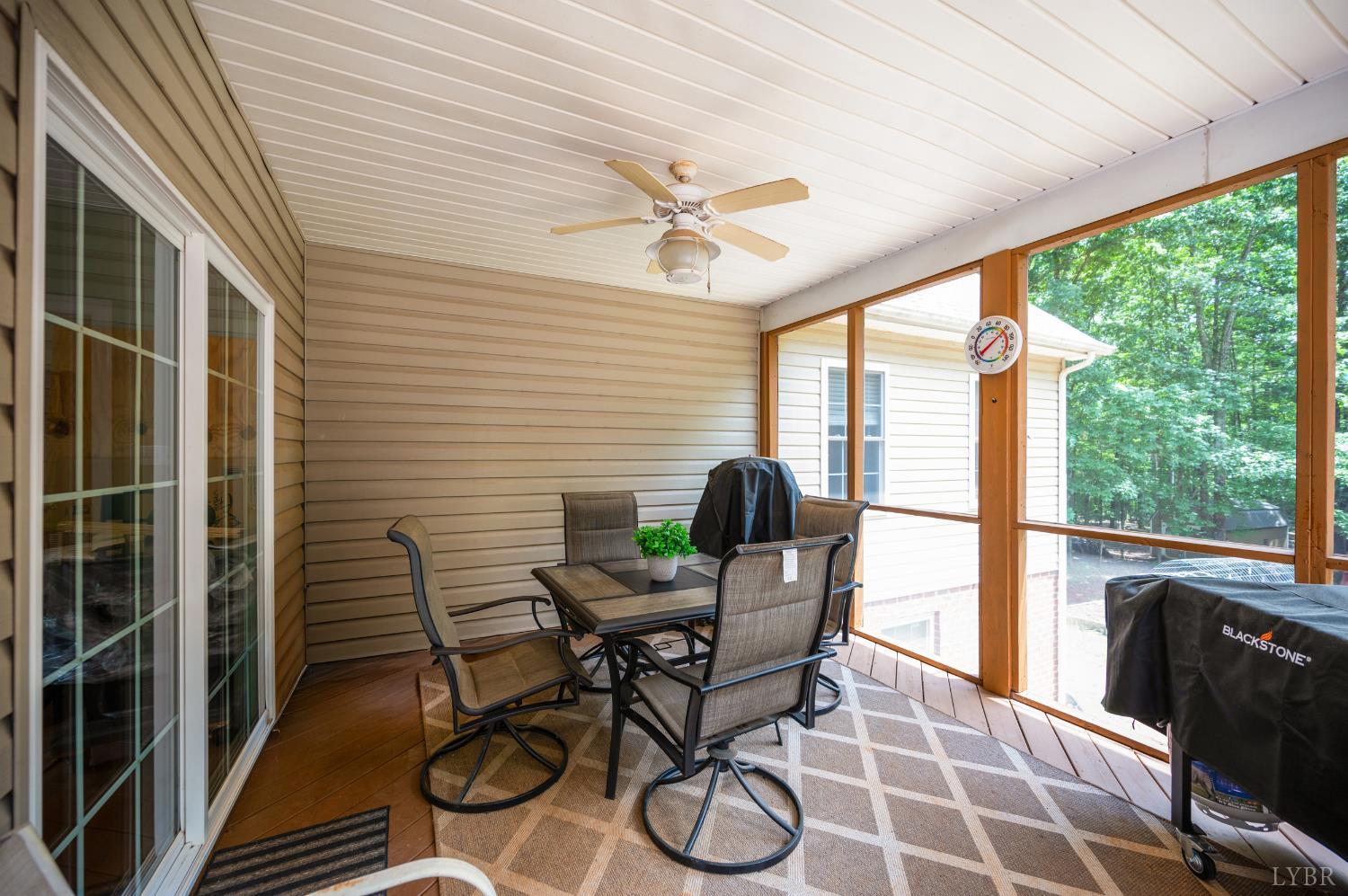 429 Matohe Road Monroe, VA 24574 - Photo 49 of 73 a view of a porch with furniture and wooden floor