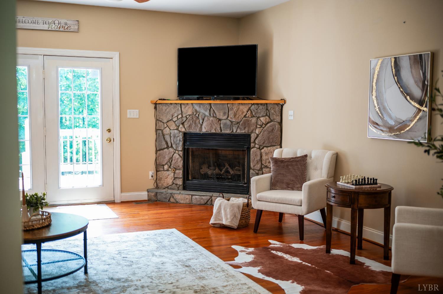 429 Matohe Road Monroe, VA 24574 - Photo 63 of 73 a living room with furniture and a fireplace