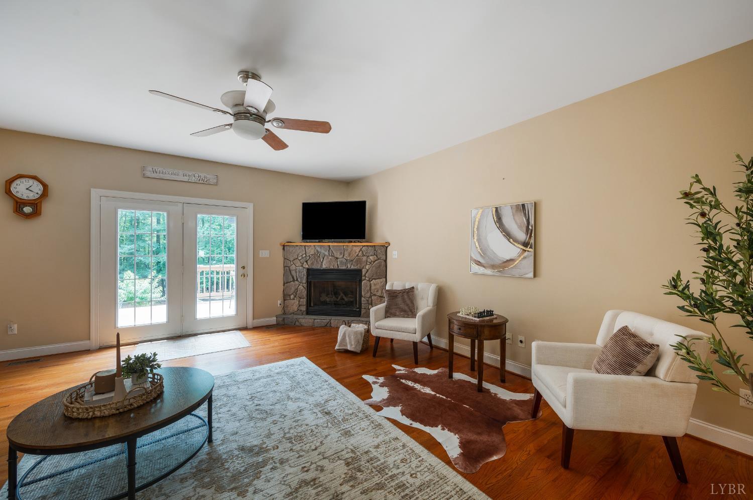 429 Matohe Road Monroe, VA 24574 - Photo 10 of 73 a living room with furniture and a fireplace
