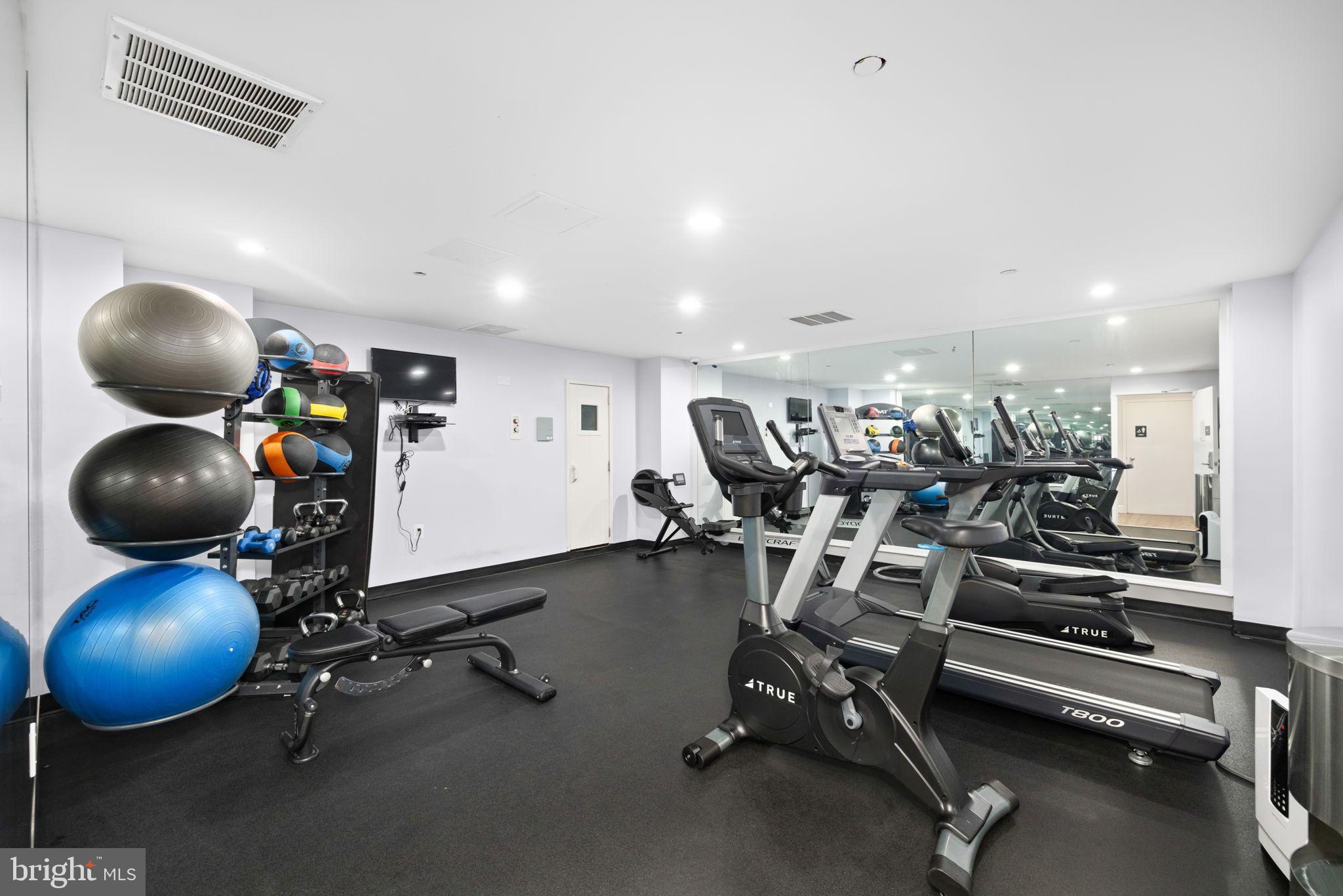 1301 North Courthouse Road, Unit 1805 Arlington, VA 22201 - Photo 38 of 40 a view of a room with gym equipment