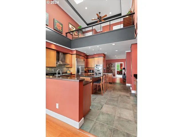 a view of a living room with a flat screen tv