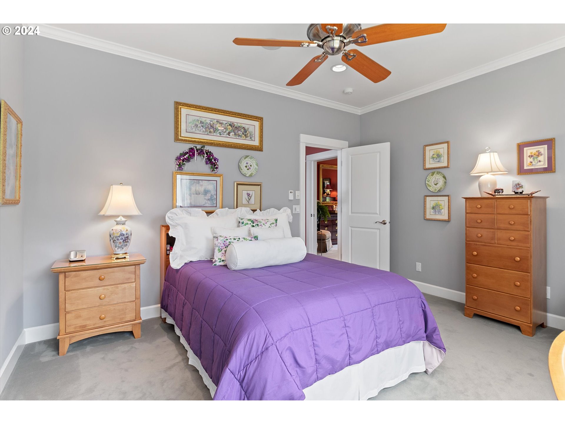 50040 South Beach Road Neskowin, OR 97149 - Photo 24 of 46 a bedroom with a bed and dresser