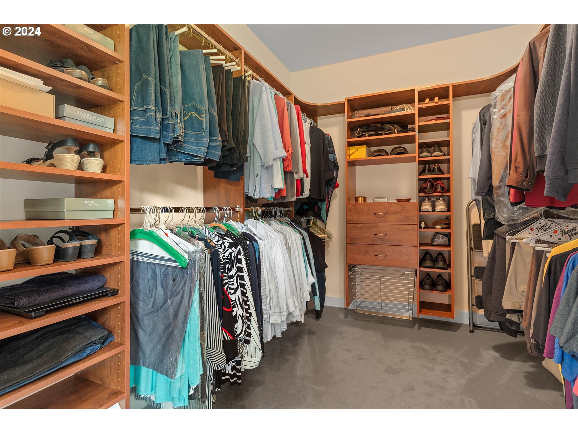 50040 South Beach Road Neskowin, OR 97149 - Photo 27 of 46 a view of walk in closet with clothes and shoes