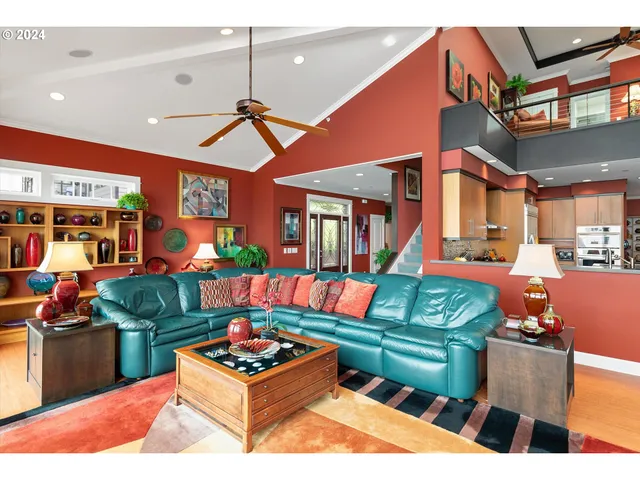 a living room with patio furniture and a fireplace