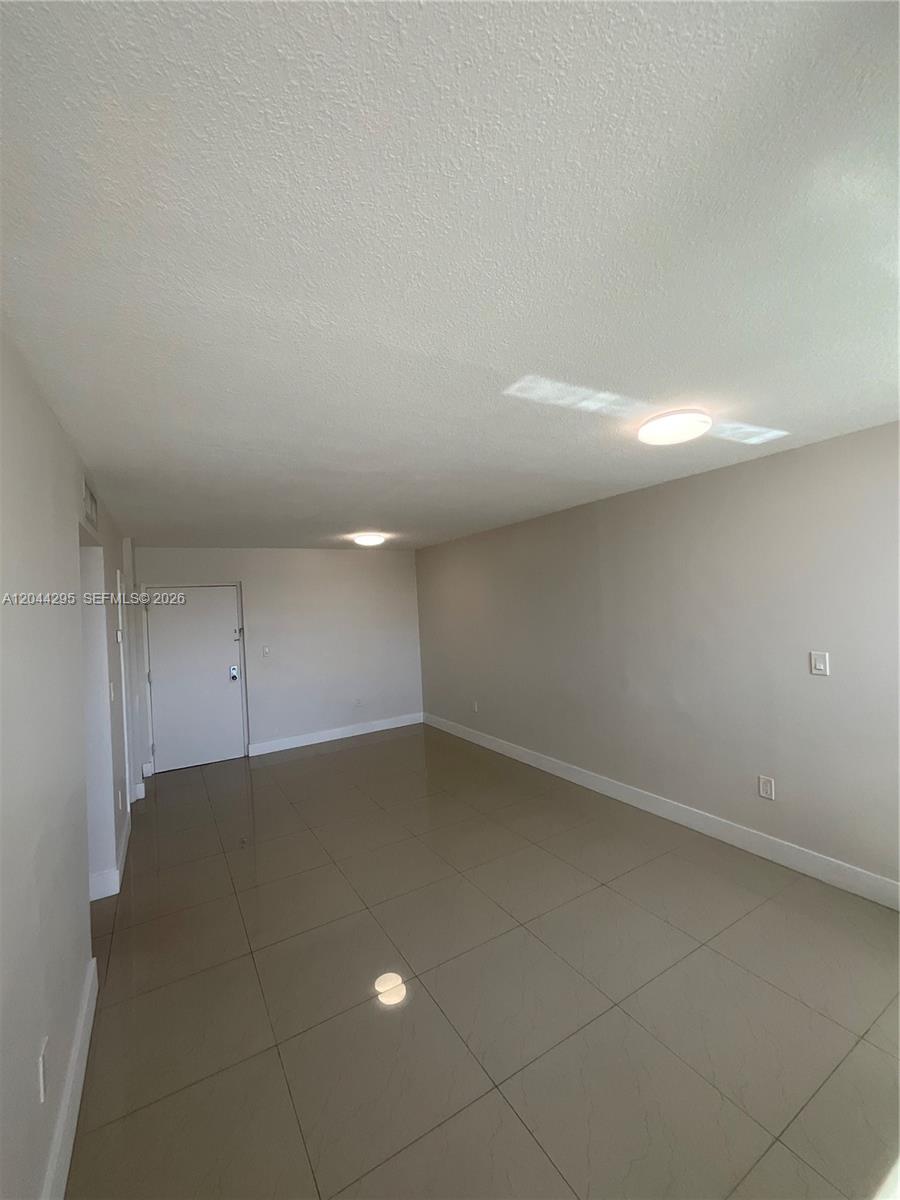9441 Southwest 4th Street, Unit 214 Miami, FL 33174 - Photo 9 of 22 a view of an empty room