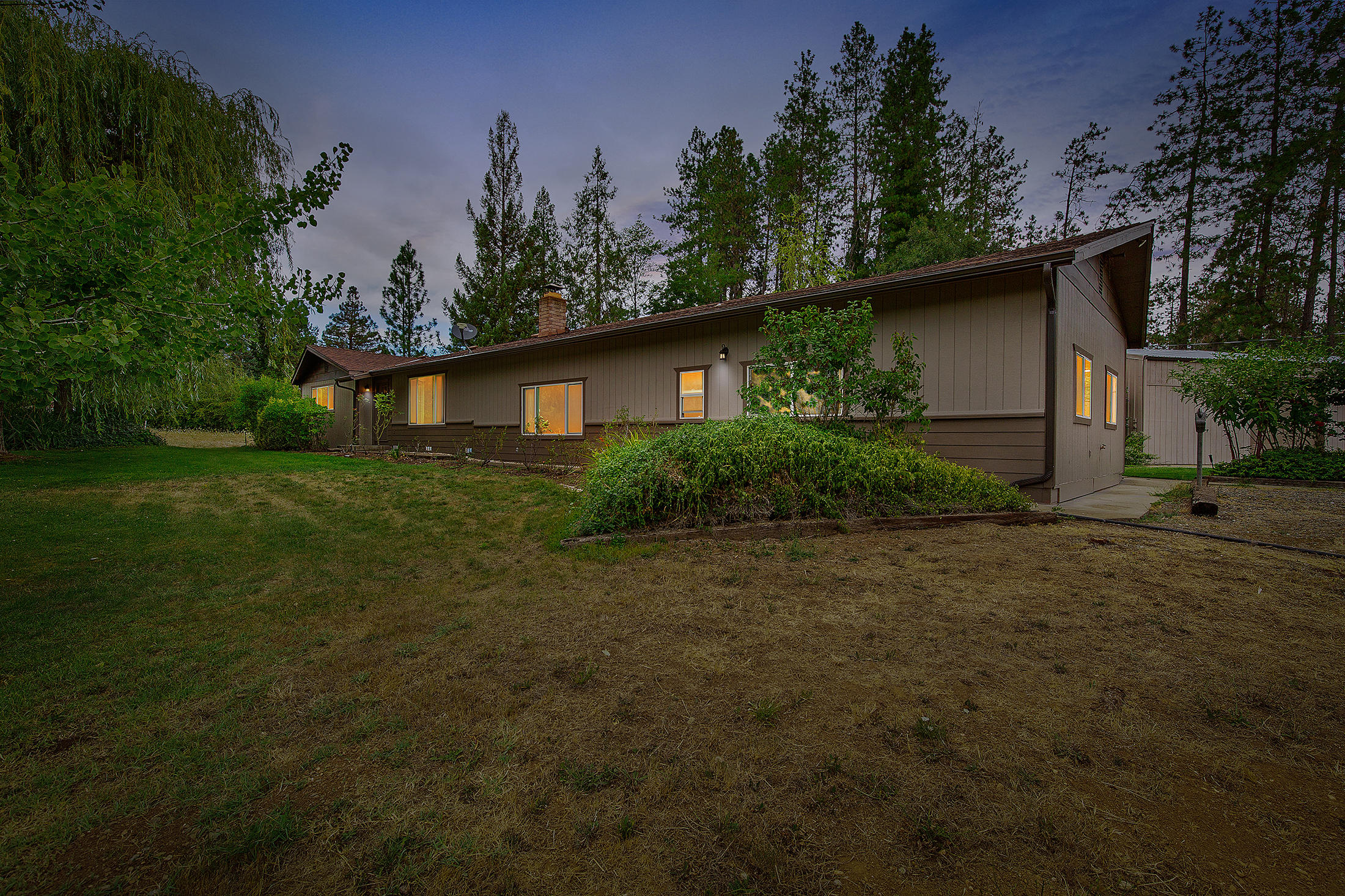 6141 New Hope Road Grants Pass, OR 97527 - Photo 5 of 49 Home at dusk
