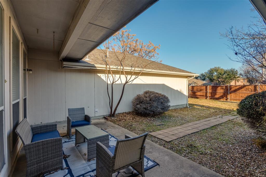 308 Glen Ridge Drive Murphy, TX 75094 - Photo 29 of 36 a room with a table and chairs