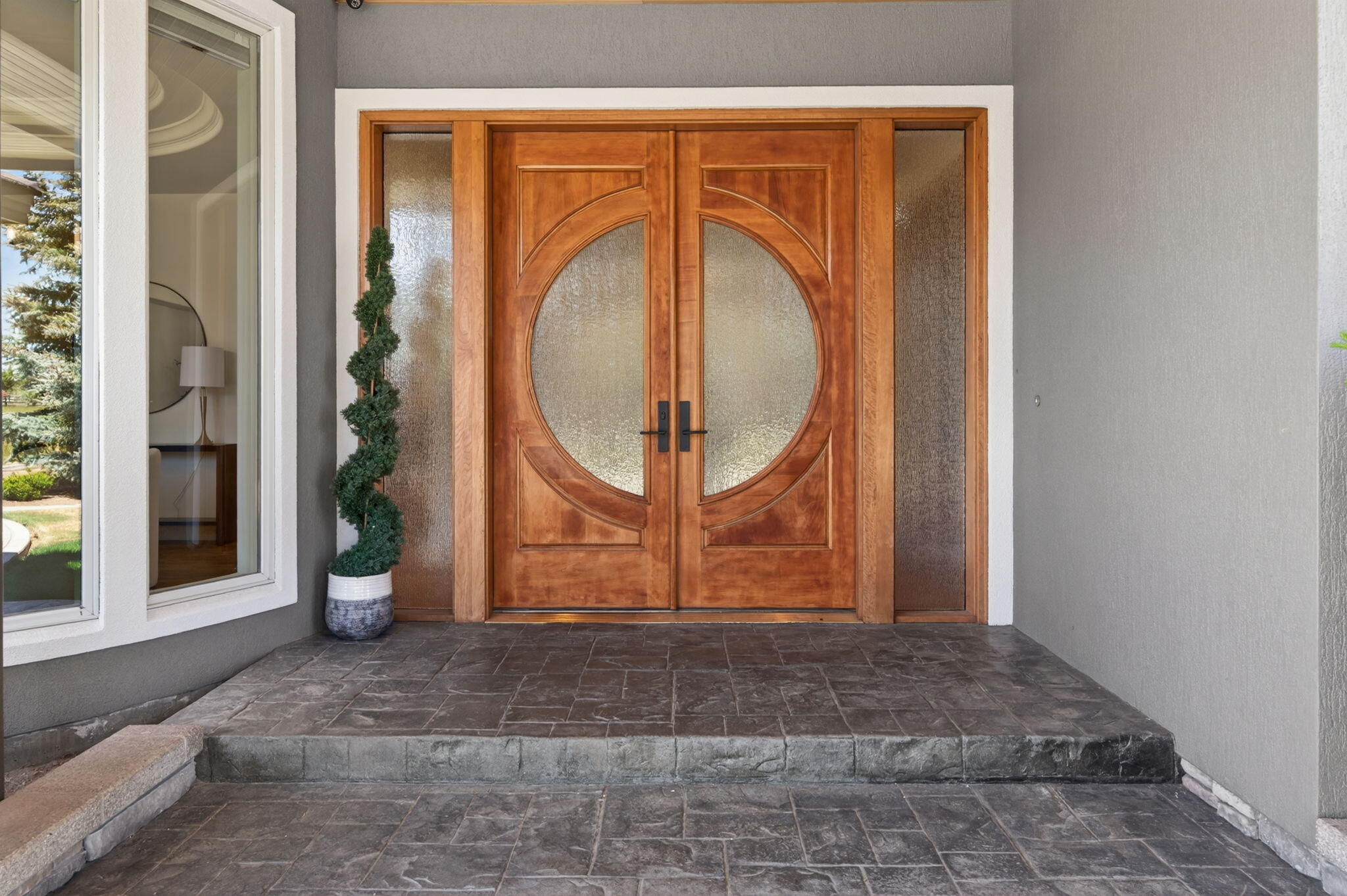 20180 Winston Loop Bend, OR 97703 - Photo 5 of 59 a view of a door with a potted plant in front of door