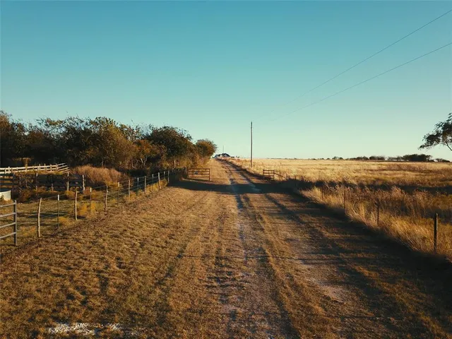 a view of a backyard of a house