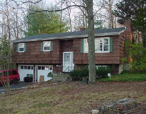 4 Hillcrest Road Danbury, CT 06811 - Photo 1 of 1 a view of a house with a yard and large tree