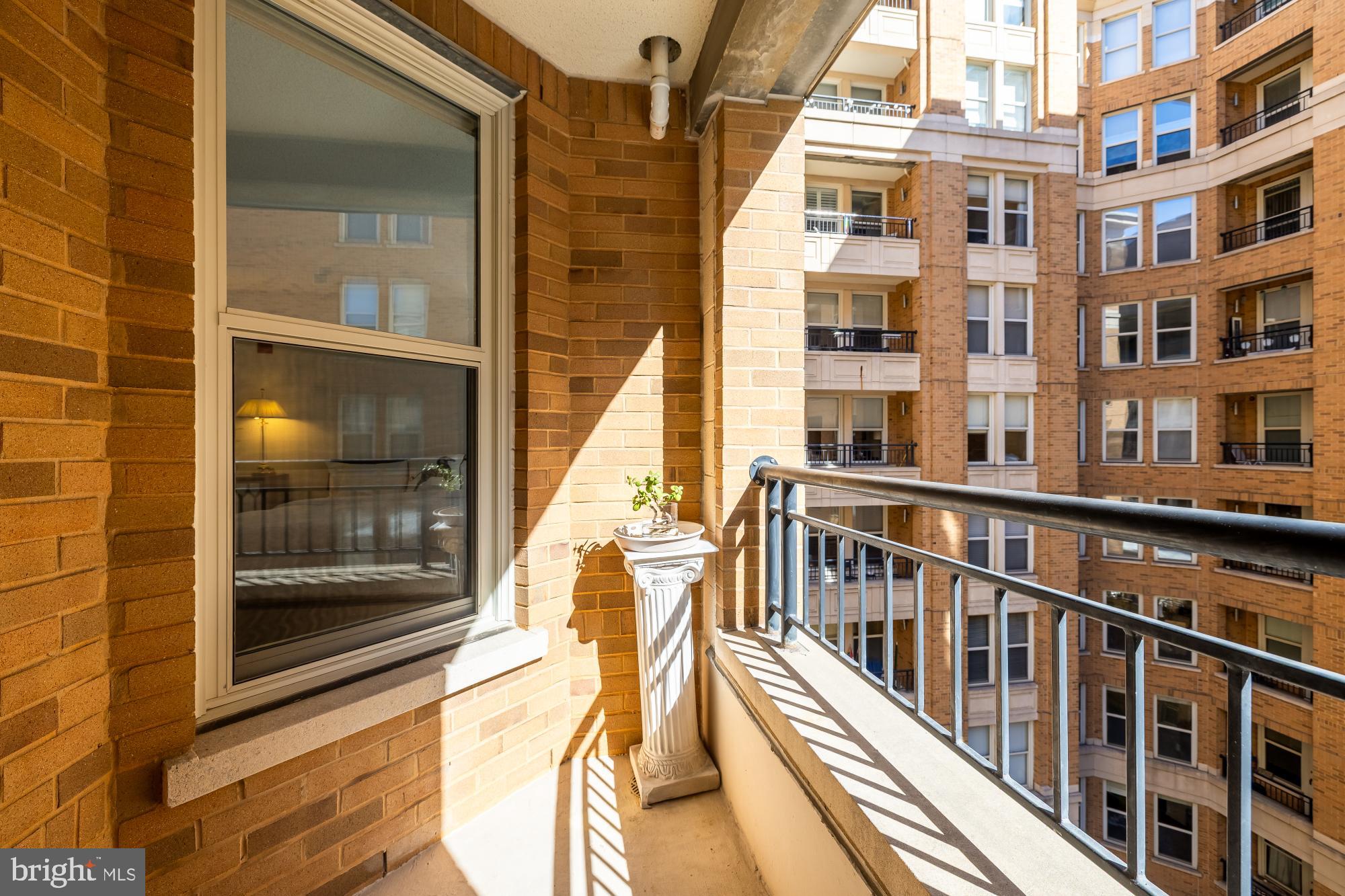 915 E Street Northwest, Unit 815 Washington, DC 20004 - Photo 21 of 26 Sunlit balcony with courtyard views.
