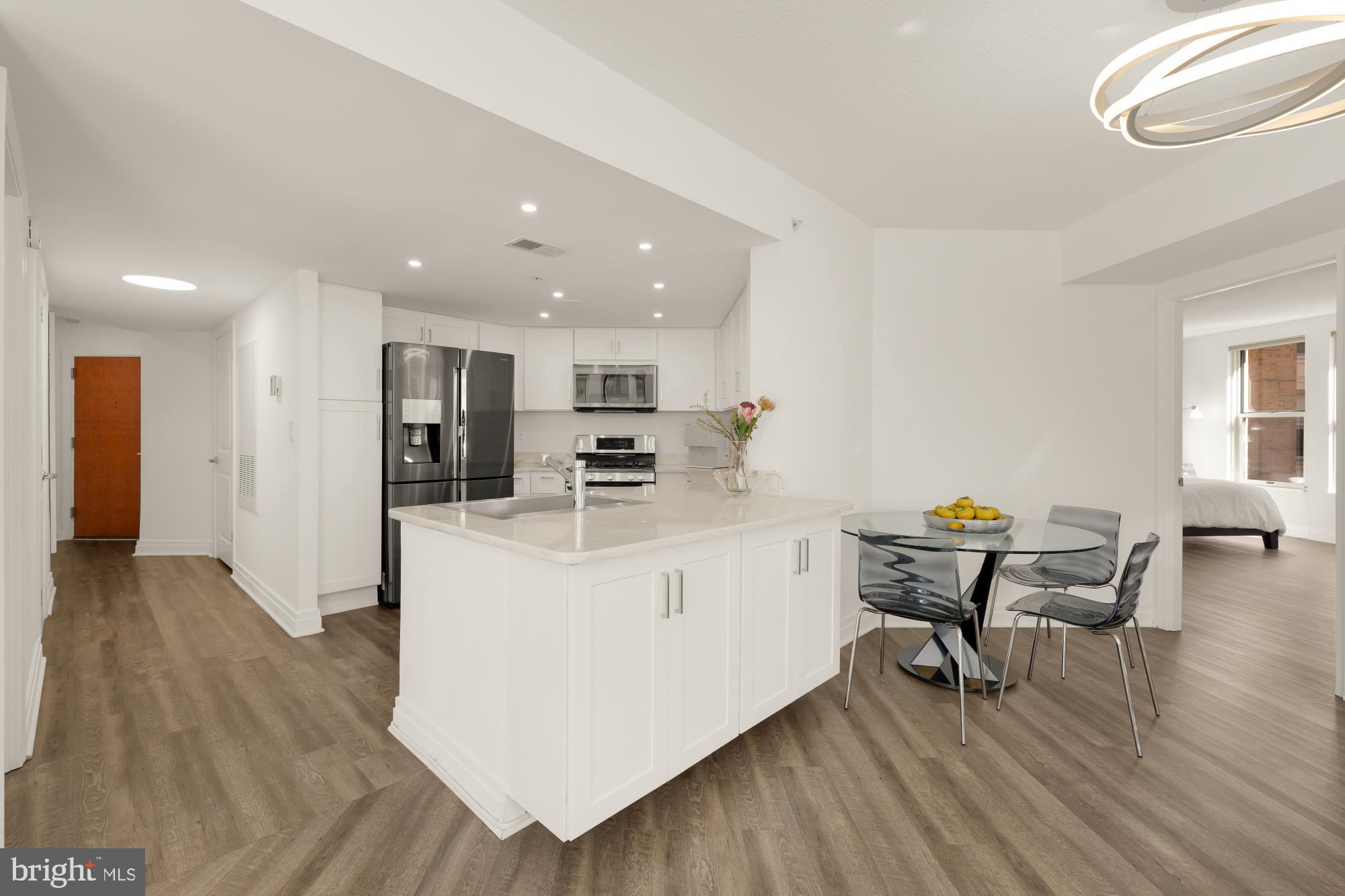 915 E Street Northwest, Unit 815 Washington, DC 20004 - Photo 9 of 26 Modern kitchen with sleek finishes.