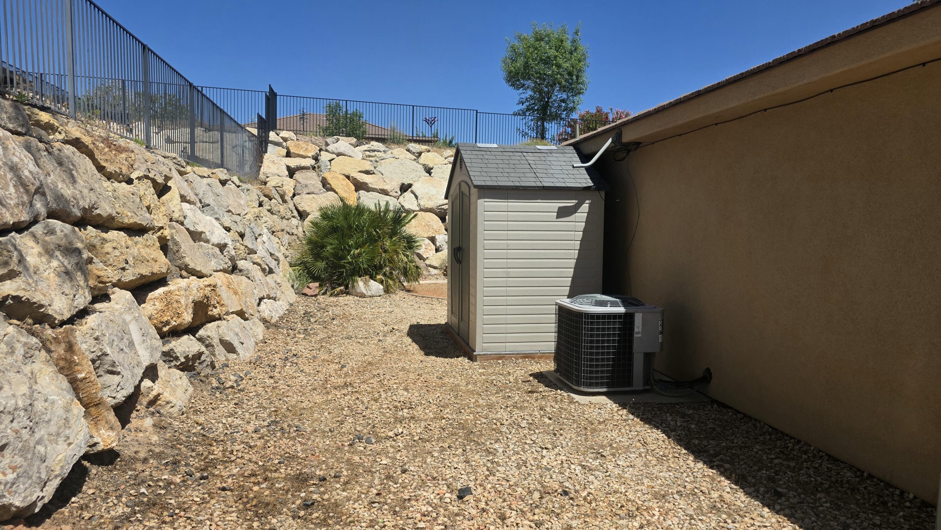 357 East 860 North Hurricane, UT 84737 - Photo 20 of 20 Side yard - Shed