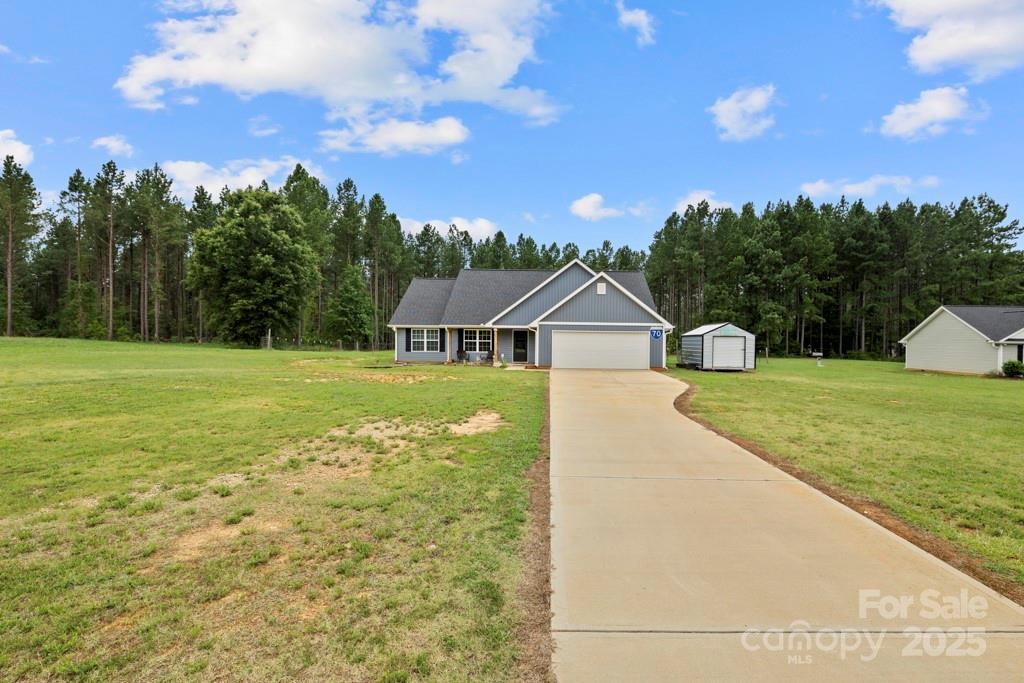 4268 Fletcher Funderburk Road Lancaster, SC 29720 - Photo 1 of 26 a view of swimming pool with a yard