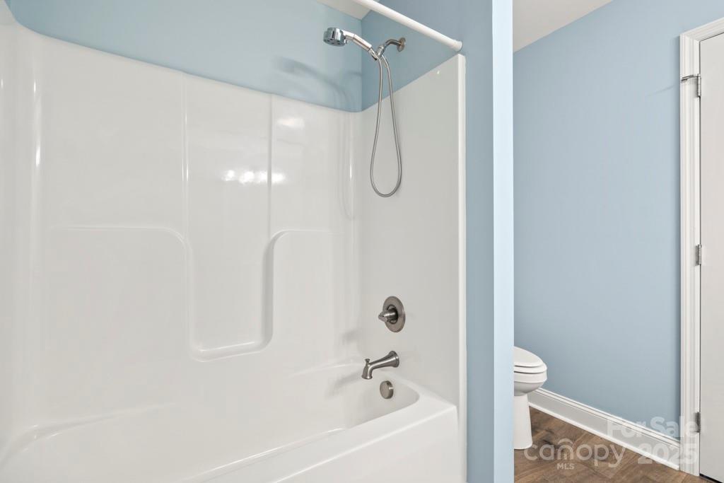 4268 Fletcher Funderburk Road Lancaster, SC 29720 - Photo 18 of 26 a bathroom with a shower and a bathtub