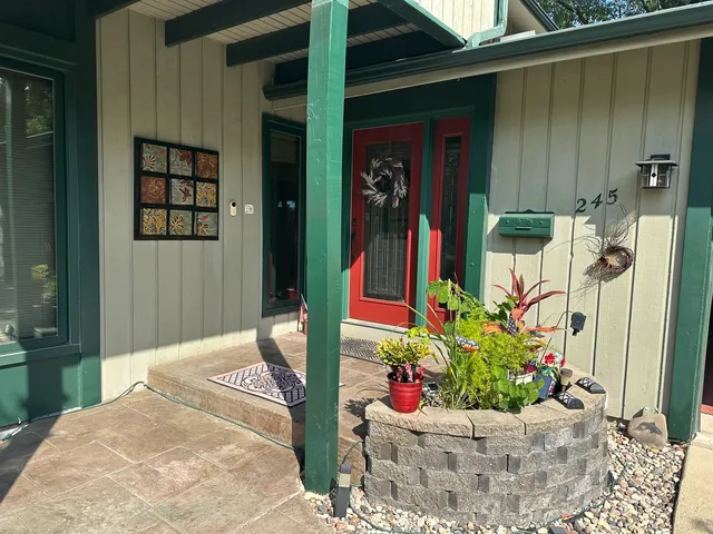 a house view with a potted plant
