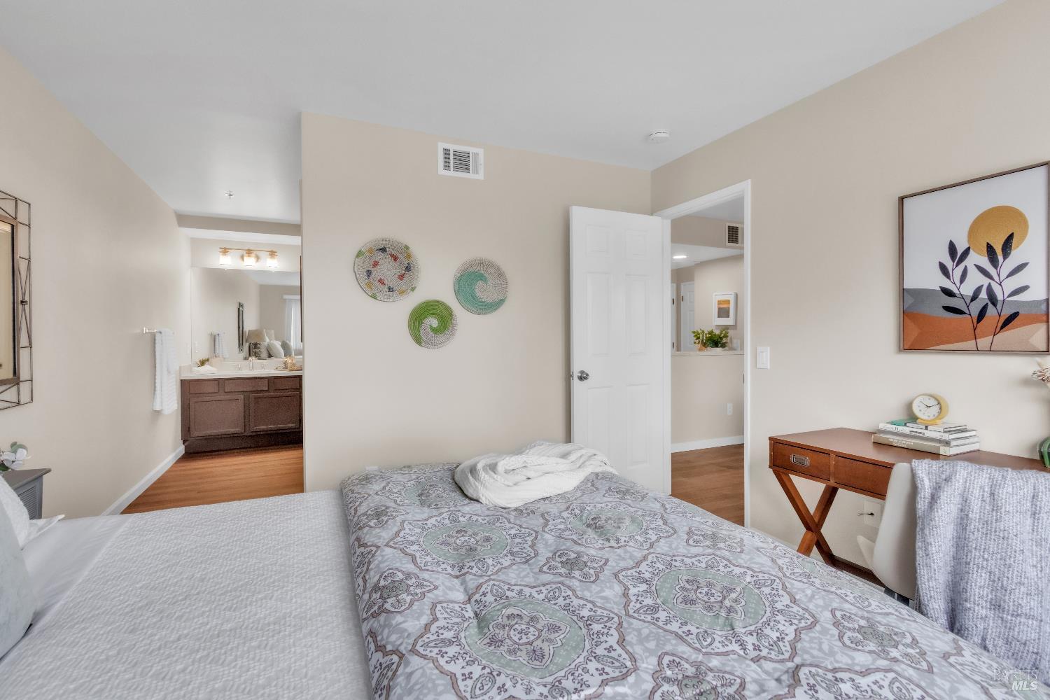 202 Mariner Way Novato, CA 94945 - Photo 12 of 27 a bedroom with furniture and wooden floor