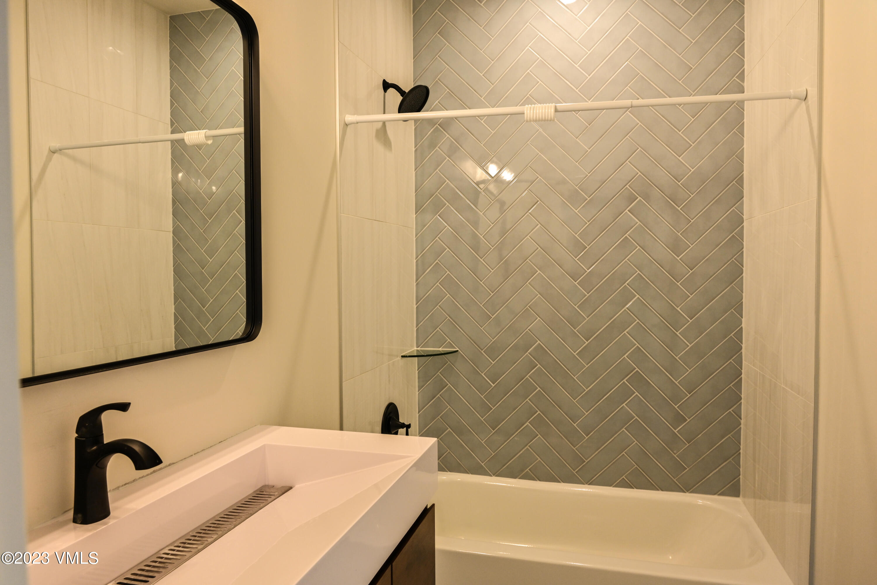 207 Aidan Road Eagle, CO 81631 - Photo 20 of 26 a bathroom with a sink and a shower