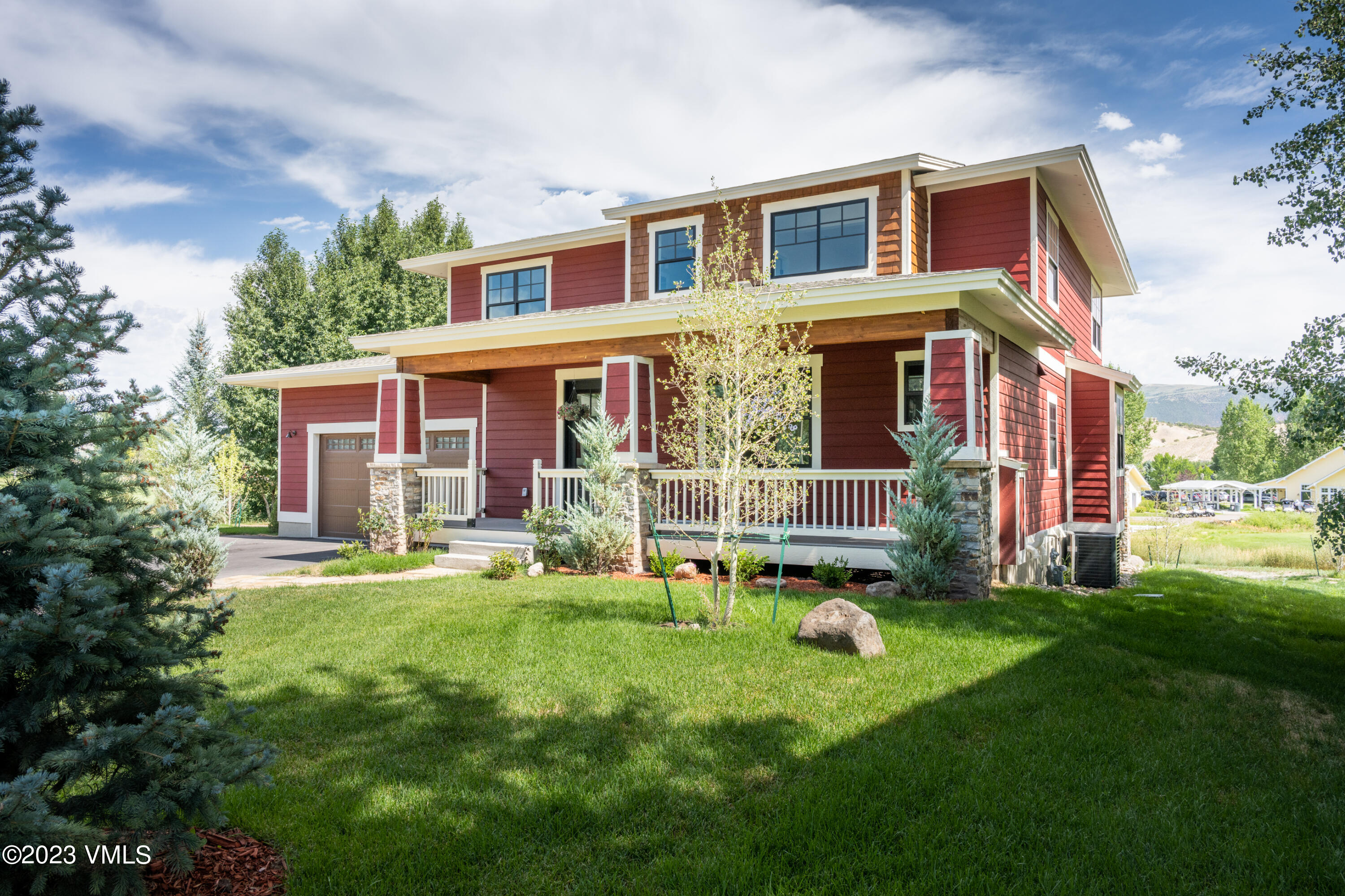 207 Aidan Road Eagle, CO 81631 - Photo 2 of 26 a front view of house with yard and outdoor seating
