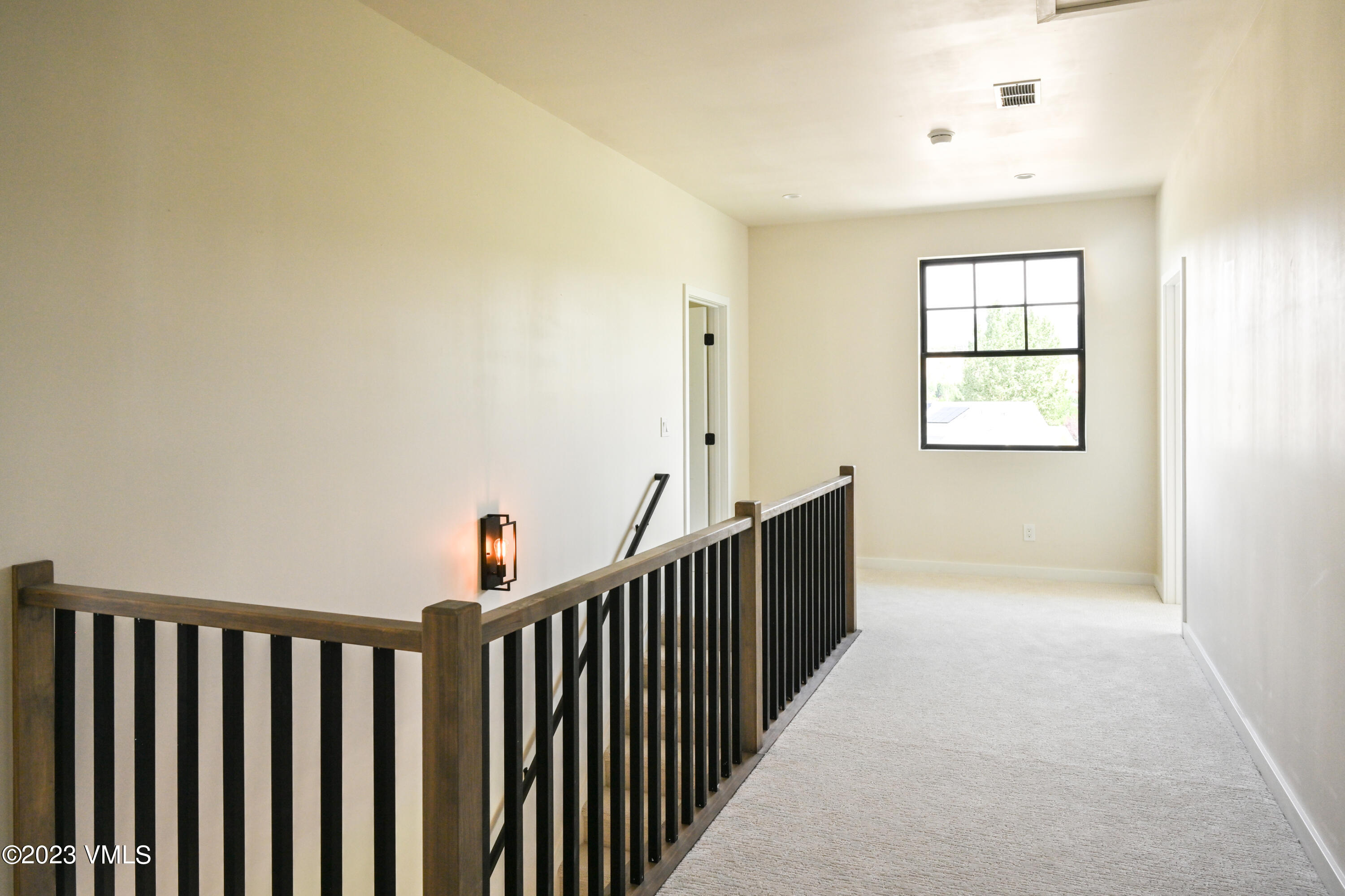 207 Aidan Road Eagle, CO 81631 - Photo 22 of 26 a view of hallway with window