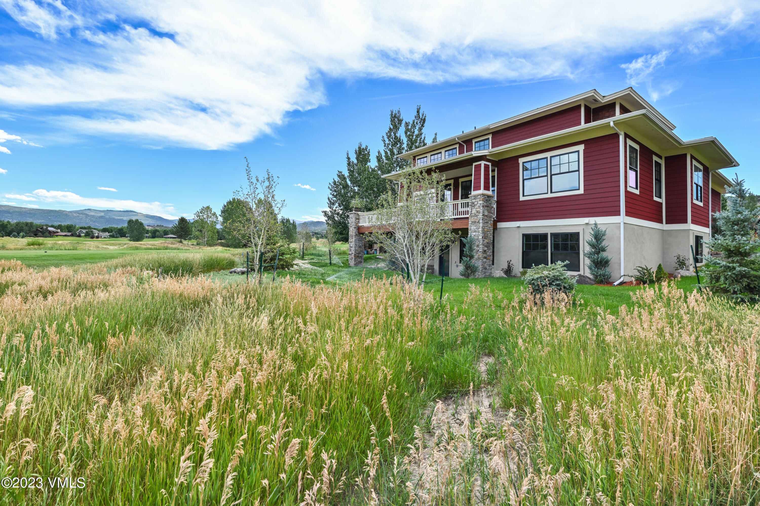 207 Aidan Road Eagle, CO 81631 - Photo 26 of 26 a front view of a house with a yard