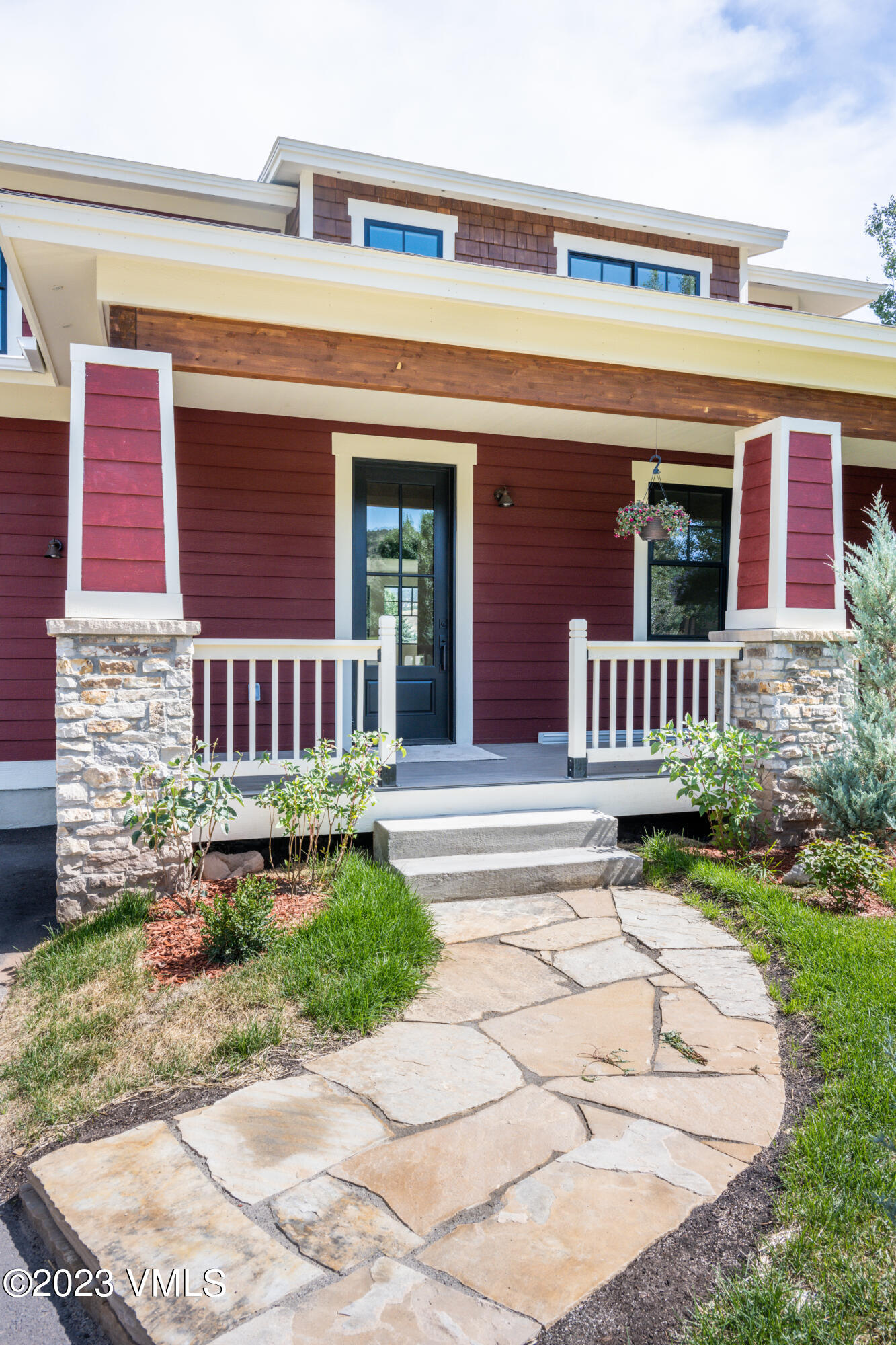 207 Aidan Road Eagle, CO 81631 - Photo 3 of 26 a view of a house with a yard and sitting area